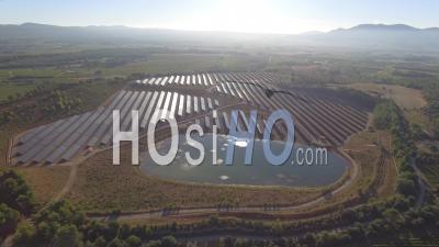 Solar Panels In An Array In The Countryside With Vines Near Puyloubier, Bouches-Du-Rhone, France – Video Drone Footage