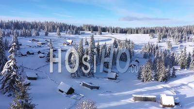 Stunning Aerial View Of Snow Covered Village - Video Drone Footage