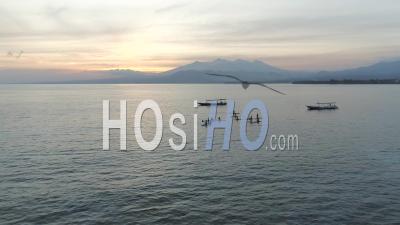 Paddleboarding On Gili Island Near Bali Indonesia - Video Drone Footage