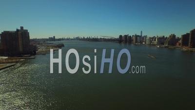 Nyc New York Usa Low Flying Almost Into East River With Lower Manhattan Cityscape - Video Drone Footage