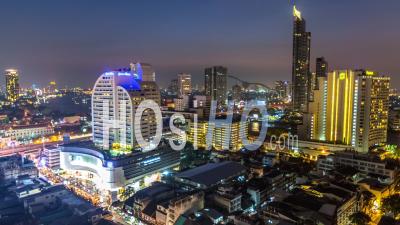 Late Evening Cityscape Downtown Time Lapse Of Bangkok Thailand - Video Drone Footage