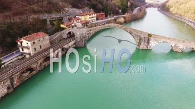 Aerial Footage Of Bridge Of Mary Magdalene Also Know As The Bridge Of The Devil Lucca Italy - Video Drone Footage