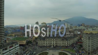 Lima Peru Flying Over Park Plaza And Traffic Panning With Cityscape Views. - Video Drone Footage
