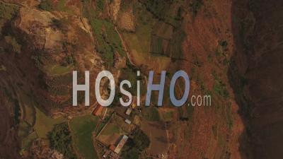 Peru Flying Over Mountain Hillsides Looking Down - Video Drone Footage