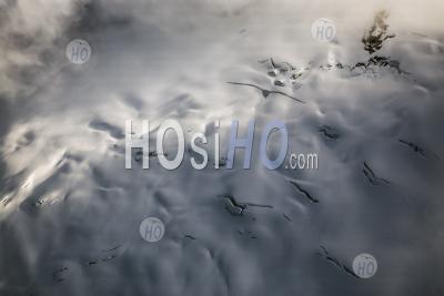 Crevasses On A  Fog Shrouded Glacier Landscape Coast Mountains Bc - Aerial Photography