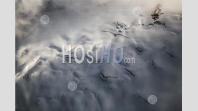 Crevasses On A  Fog Shrouded Glacier Landscape Coast Mountains Bc - Aerial Photography