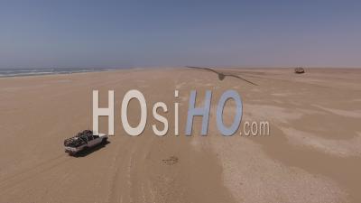 White Pick Up Driving To The Eduard Bohlen Ship Wreck, Namib Desert