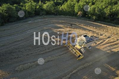 Combine In A Wheat Field - Aerial Photography