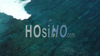 Surfers On Ocean, Mentawai Islands, Indonesia - Video Drone Footage