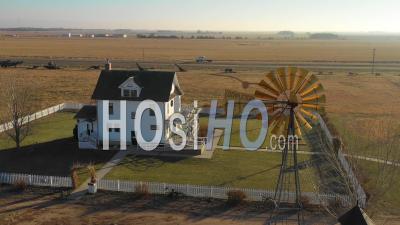 Aerial Video Drone Footage Of A Classic Farmhouse Farm And Barns In Rural Midwest America, York, Nebraska
