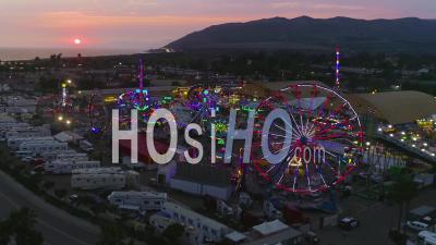 Aerial View Of A Large County Fair And Fair Grounds At Sunset , With Ferris Wheel, Ventura County Fair - Video Drone Footage