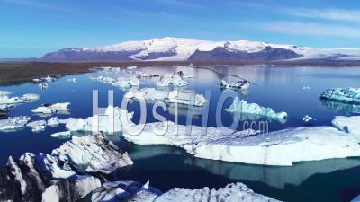 Aerial View Over Icebergs In The Arctic, Jokulsarlon, Glacier Lagoon In Iceland - Video Drone Footage