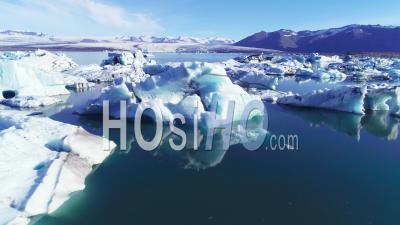 Aerial View Over Icebergs In The Arctic, Jokulsarlon, Glacier Lagoon In Iceland - Video Drone Footage
