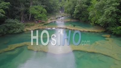An Aerial View Of Remarkable Waterfalls And Green Pools On The Semuc Champey River In Guatemala - Video Drone Footage