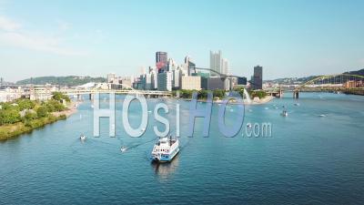 Aerial View Over A Paddlewheel Tourist Boat On The Monongahela River Over Pittsburgh, Pennsylvania - Video Drone Footage