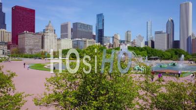 Aerial View Of Downtown Chicago With Fountain Foreground - Video Drone Footage