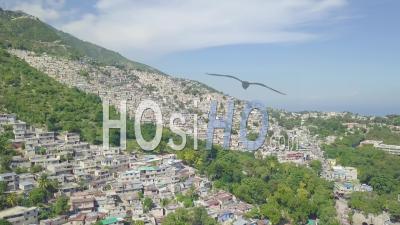 Amazing Panning Aerial View Over The Slums, Favela And Shanty Towns In The Cite Soleil District Of Port Au Prince, Haiti - Video Drone Footage