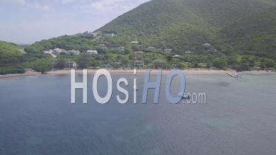 Aerial View Over The Shores And Beaches Of Nevis, An Island In The Caribbean - Video Drone Footage