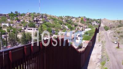 Aerial View Along The Us Mexico Border At Nogales, Arizona - Video Drone Footage