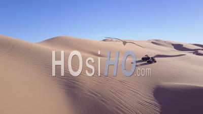Dune Buggies And Atvs Race Across The Imperial Sand Dunes In California - Video Drone Footage