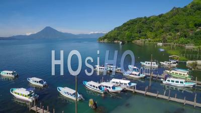 Aerial View Over Lake Amatitlan In Guatemala Reveals The Pacaya Volcano - Video Drone Footage