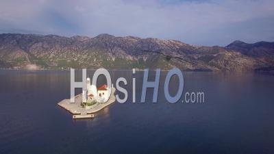 Aerial View Over The Our Lady Rock Island Church In Boka Bay, Montenegro - Video Drone Footage