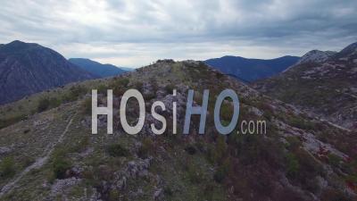 Aerial View Over The Mountains Of Montenegro Reveals Beautiful Boka Bay - Video Drone Footage