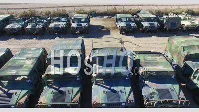 Aerial View Over A Military Vehicle Storage Depot - Video Drone Footage