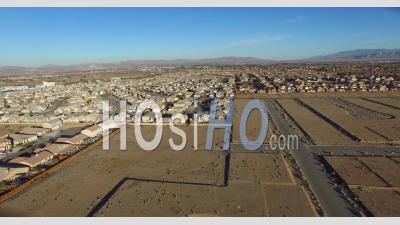 Aerial View Over Desert Reveals Housing Tracts In The Desert - Video Drone Footage