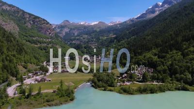 Mountain Villages By A Lake In The Italian Alps - Video Drone Footage