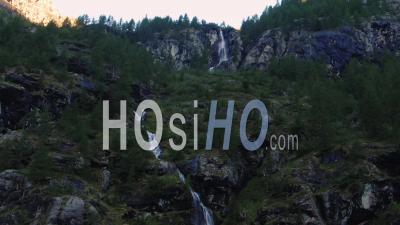 A Mountain Stream Of Water In The Italian Alps - Video Drone Footage