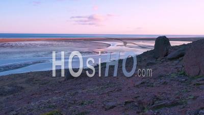 Aerial View Of Tidal Bay And Sunset Patterns Near Rauoisandur Beach, Westfjords, Iceland - Video Drone Footage