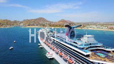 Huge Cruise Ship Aerial View Off Coast Cabo San Lucas, Baja California, Mexico Hotels And Resorts Along Coast - Video Drone Footage