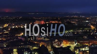 Establishing Aerial View Of Edinburgh At Night, Edinburgh Castle, United Kingdom - Video Drone Footage