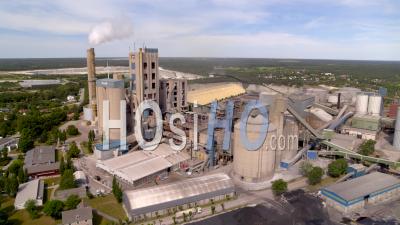 Cement Factory With Open Pit Quarry Background, Sweden - Video Drone Footage