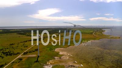 Aerial View Over Coastal Wind Farm, Sweden - Video Drone Footage