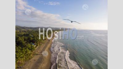 Sunset Over Beach With Mountain Background, Philippines, Drone View - Aerial Photography