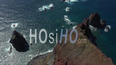Rocks In The Ocean At Do Topo Lighthouse Point In San Jorge Azores - Video Drone Footage