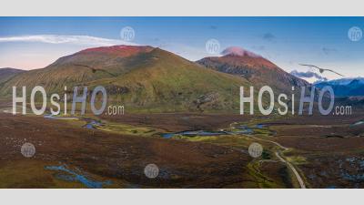 Aerial Panoramic View Of Beinn Spionnaidh And Cranstackie At Sunset In Scotland - Aerial Photography