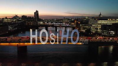 Cars Driving On London Bridge In London, At Sunset - Video Drone Footage