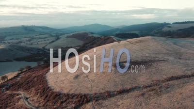 Rolling Hills Of British Countryside At Frosty Sunrise - Video Drone Footage