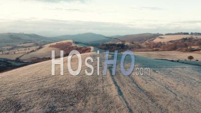 Rolling Frosty Hills Of British Countryside - Video Drone Footage