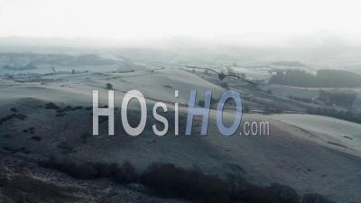 Frosty Hills Of British Countryside At Sunrise - Video Drone Footage