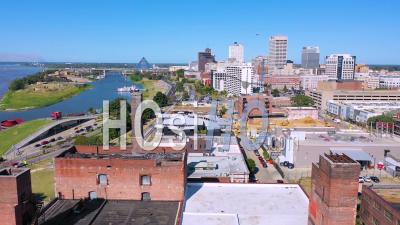 Memphis Tennessee Waterfront And Mud Island With Memphis Pyramid Background And Old Brick Factories Foreground - Aerial Video By Drone
