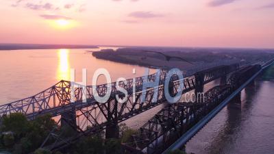 Sunset Over Three Bridges Over The Mississippi River Near Memphis Tennessee - Aerial Video By Drone