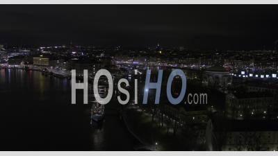 Aerial, Night City Scape Over Stockholm - Aerial Video By Drone