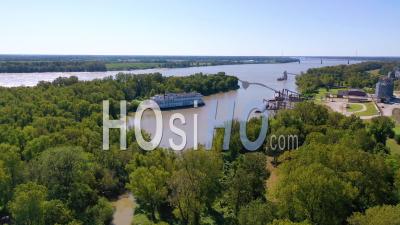 A Paddlewheel Steamboat Luxury Cruise Ship Docked In A Bay On The Mississippi River - Aerial Video By Drone