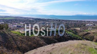2020 - Aerial Video Over The Pacific Coastal Green Hills And Mountains Behind Ventura, California Including Suburban Homes And Neighborhoods - Video Drone Footage