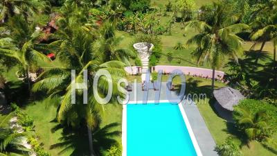 2019 – Young Tourist Woman Beside A Hotel Pool At A Tourist Resort On Vanuatu, Pacific Islands - Aerial Video By Drone