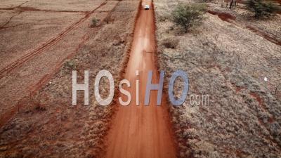 A Pickup Truck Driving On A Dirt Road On Molokai, Hawaii From Maunaloa To Hale O Lono - Aerial Video By Drone